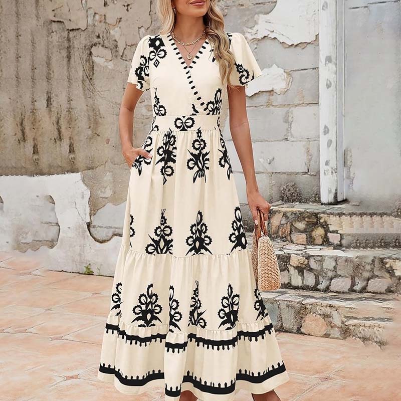 Boho-maxi-kjole md flæser og lommer – V-hals, smocket talje og lagdelt nederdel