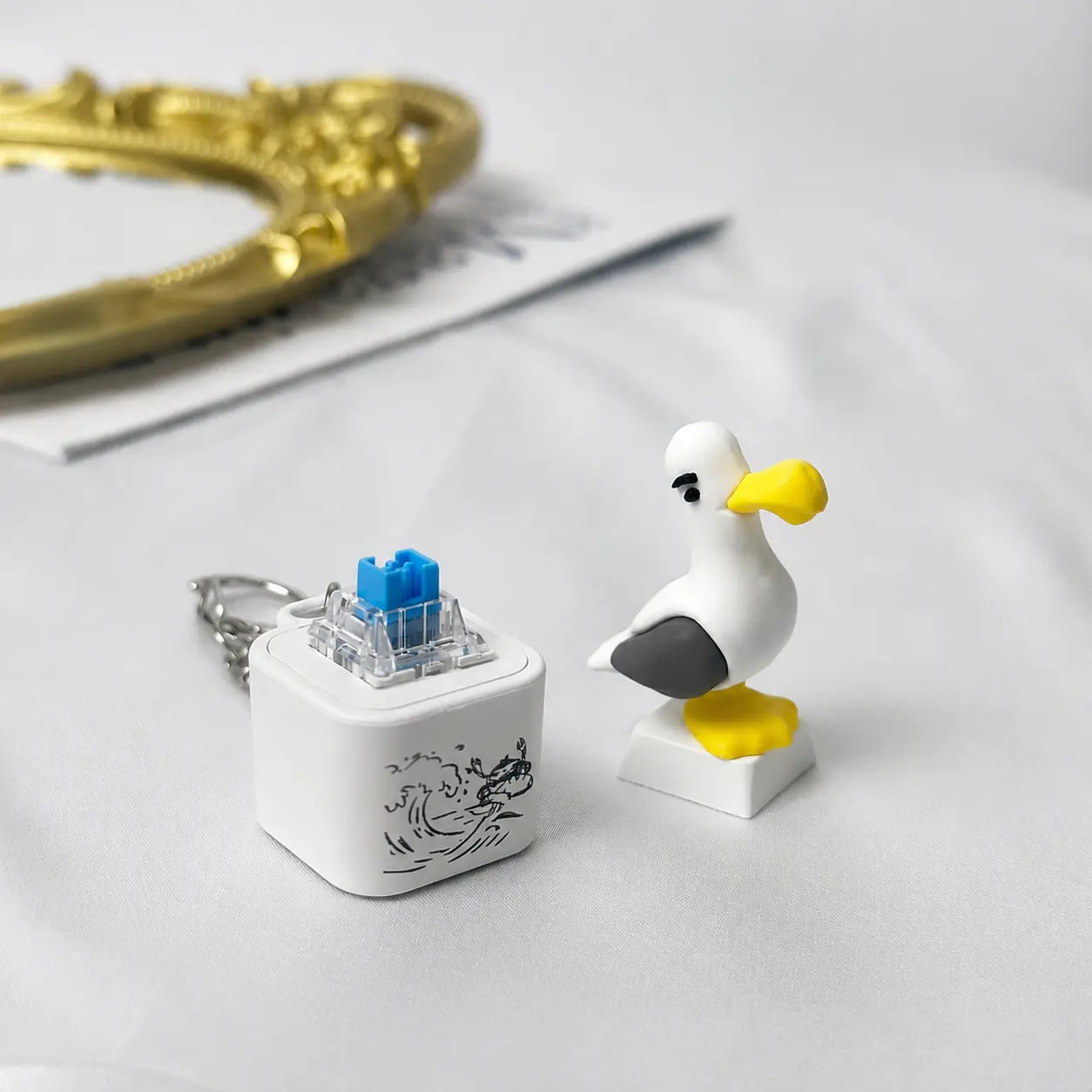 Seagull MINE! Knap-nøglering – ægte lyd og LED-lys