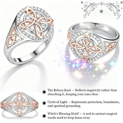 Elegant tofarvet ring med keltisk knude og zirkoni