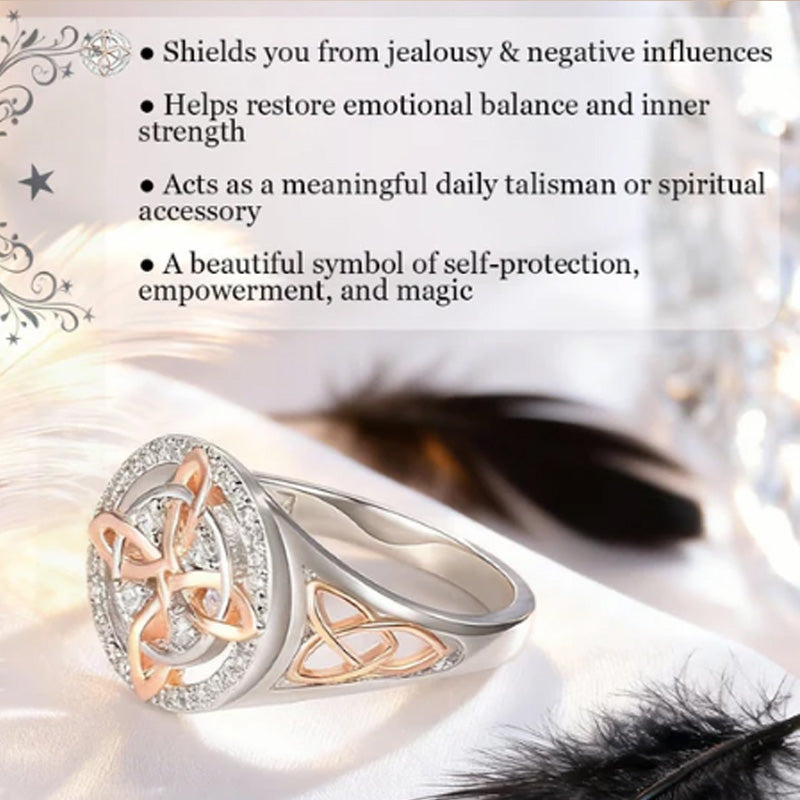 Elegant tofarvet ring med keltisk knude og zirkoni